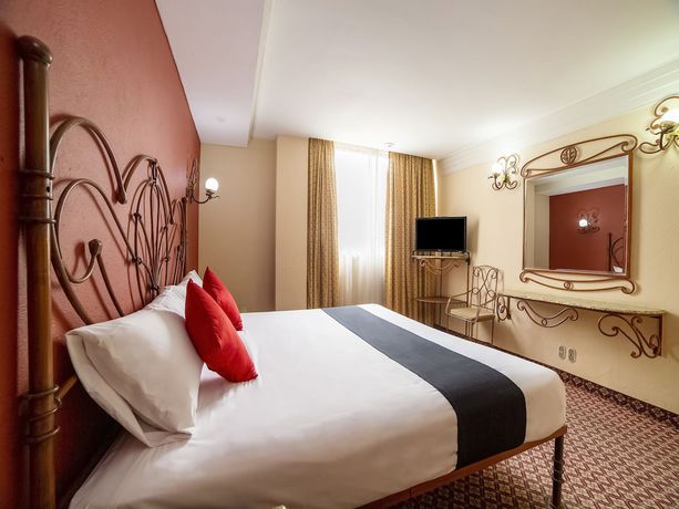 Imagen de la habitación del Hotel OYO Santa María. Foto 13