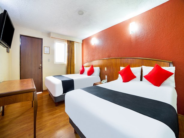 Imagen de la habitación del Hotel OYO Santa María. Foto 14