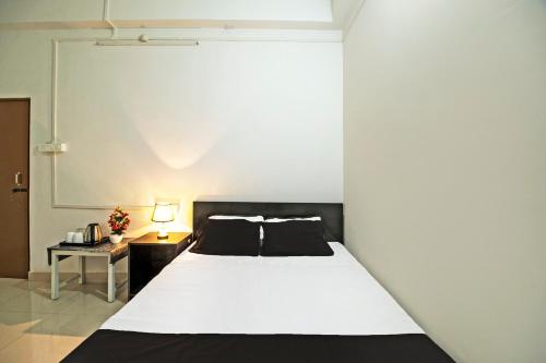 Imagen general del Hotel OYO Shriya\'s Nirvana Inn. Foto 12