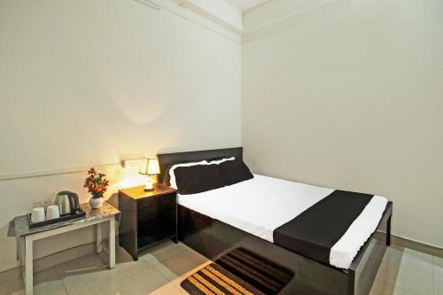 Imagen de la habitación del Hotel OYO Shriya\'s Nirvana Inn. Foto 20