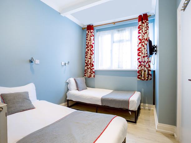 Imagen de la habitación del Hotel OYO Sino. Foto 2