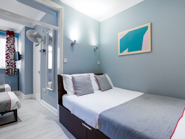 Imagen de la habitación del Hotel OYO Sino. Foto 3