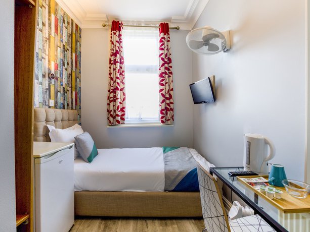 Imagen de la habitación del Hotel OYO Sino. Foto 5