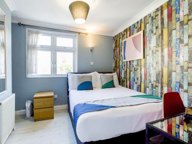 Imagen de la habitación del Hotel OYO Sino. Foto 8