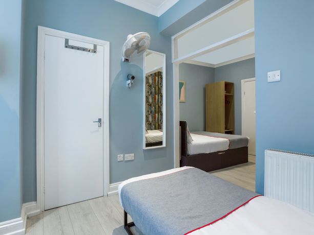 Imagen de la habitación del Hotel OYO Sino. Foto 11