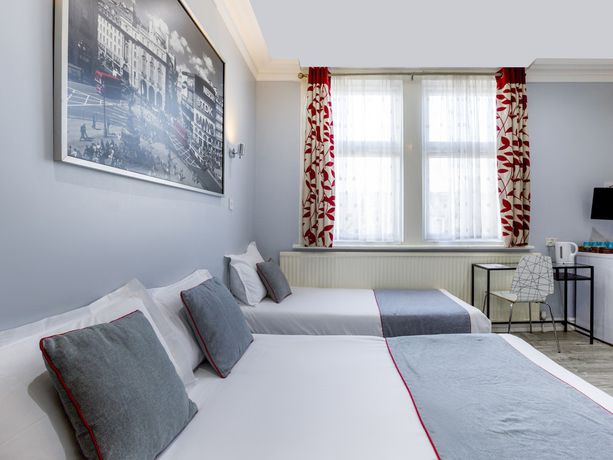 Imagen de la habitación del Hotel OYO Sino. Foto 13