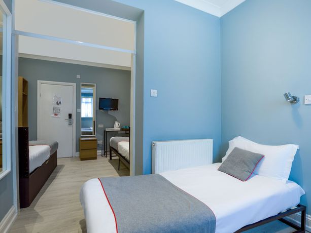 Imagen de la habitación del Hotel OYO Sino. Foto 16
