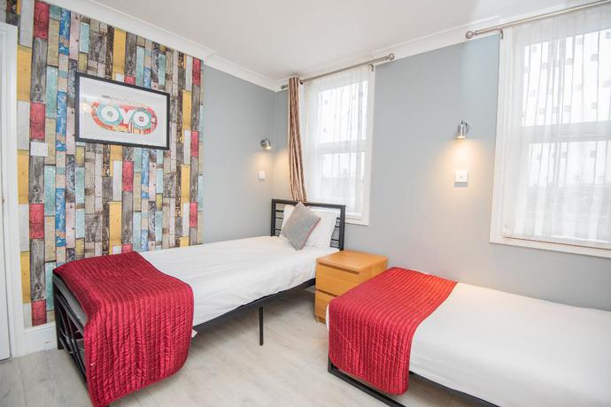 Imagen de la habitación del Hotel OYO Sino. Foto 10