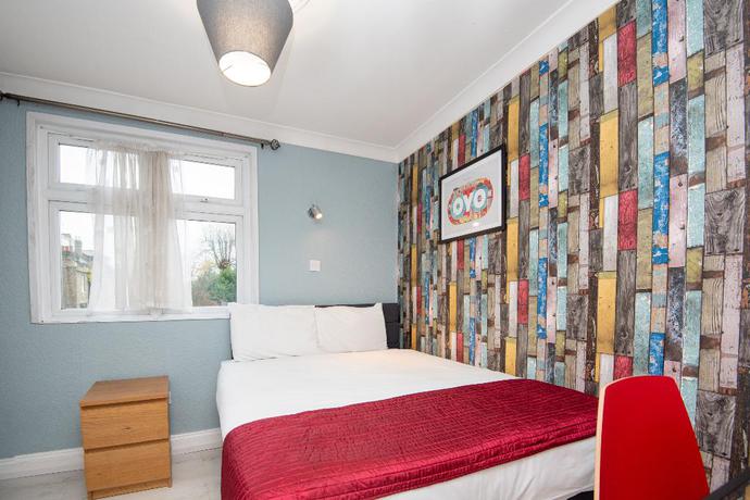 Imagen de la habitación del Hotel OYO Sino. Foto 13