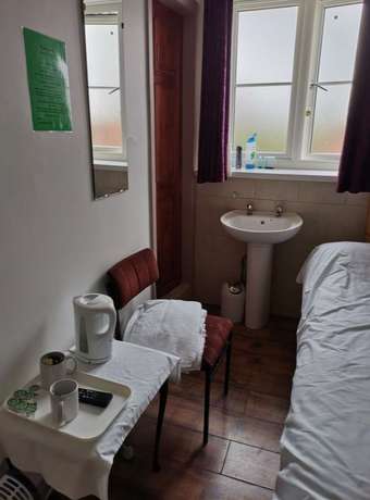 Imagen de la habitación del Hotel OYO Swan Inn, Heathrow Airport. Foto 10