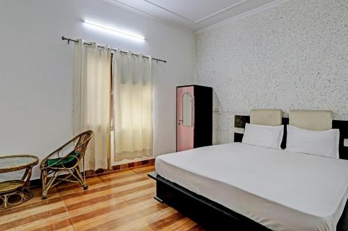 Imagen de la habitación del Hotel OYO Taj Guest House. Foto 20