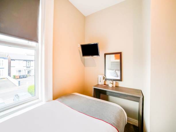 Imagen de la habitación del Hotel OYO Tequila and Dunlin Rooms Southport Central. Foto 7