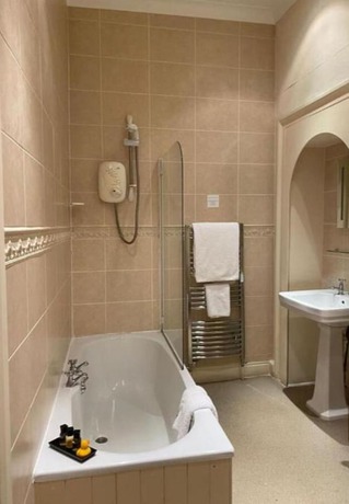 Imagen de la habitación del Hotel OYO The Leven. Foto 6