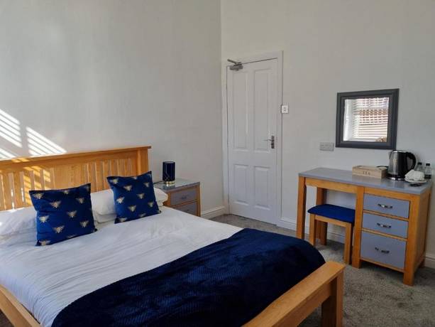 Imagen de la habitación del Hotel OYO The Leven. Foto 12