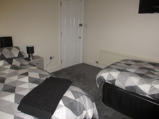 Imagen de la habitación del Hotel OYO The Pickering Park. Foto 11