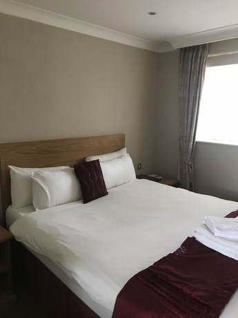 Imagen de la habitación del Hotel OYO The Rivenhall. Foto 15