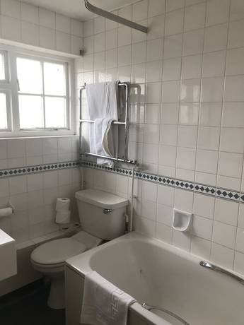 Imagen de la habitación del Hotel OYO The Rivenhall. Foto 16