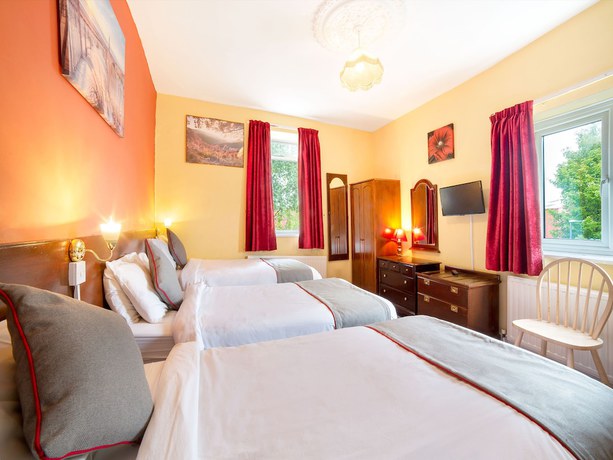 Imagen de la habitación del Hotel OYO The Royal. Foto 6