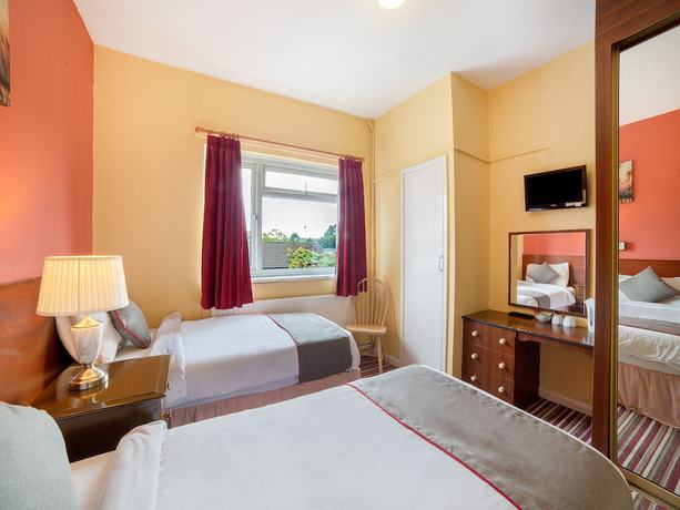 Imagen de la habitación del Hotel OYO The Royal. Foto 12