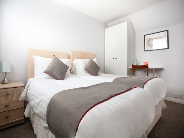 Imagen de la habitación del Hotel OYO Timothy's. Foto 9