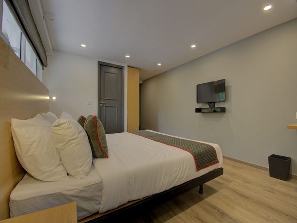 Imagen de la habitación del Hotel OYO Townhouse 150 Sahaj Palace. Foto 4