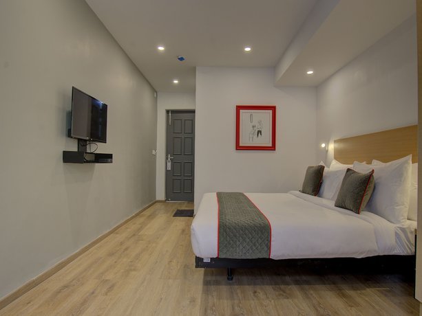 Imagen de la habitación del Hotel OYO Townhouse 150 Sahaj Palace. Foto 5