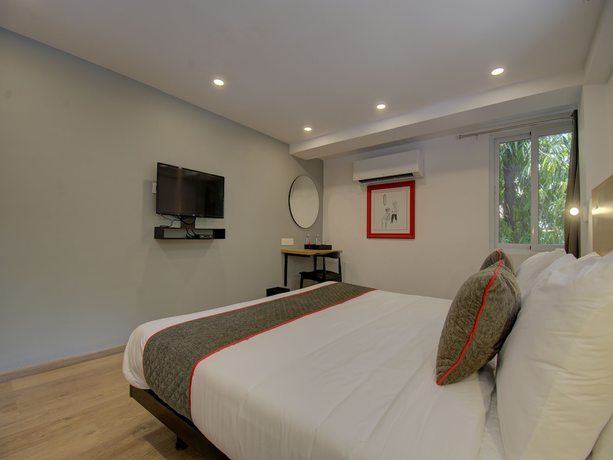 Imagen de la habitación del Hotel OYO Townhouse 150 Sahaj Palace. Foto 6