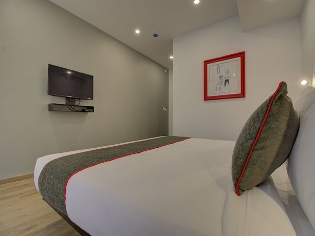 Imagen de la habitación del Hotel OYO Townhouse 150 Sahaj Palace. Foto 8