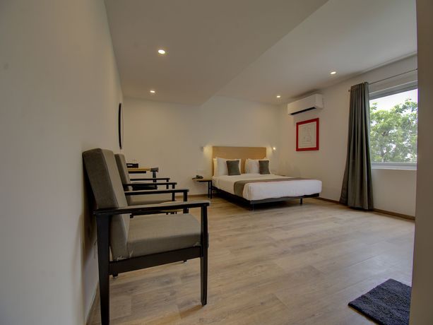 Imagen de la habitación del Hotel OYO Townhouse 150 Sahaj Palace. Foto 9