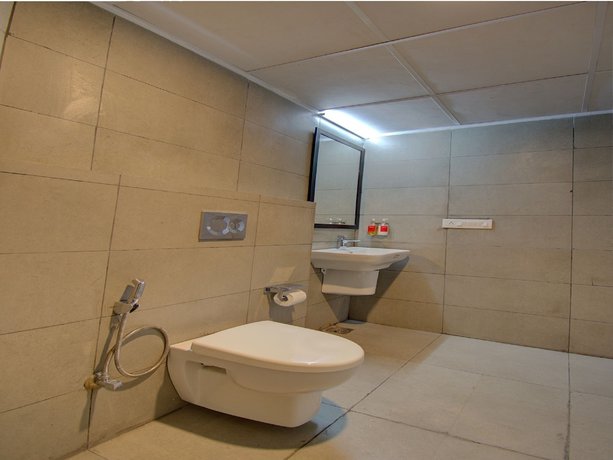 Imagen de la habitación del Hotel OYO Townhouse 150 Sahaj Palace. Foto 10