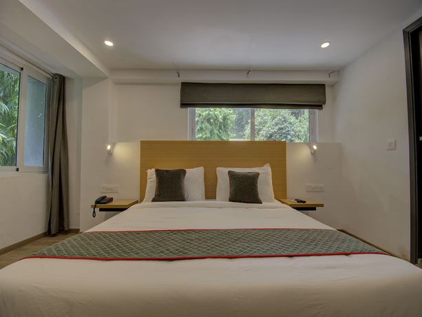 Imagen de la habitación del Hotel OYO Townhouse 150 Sahaj Palace. Foto 12