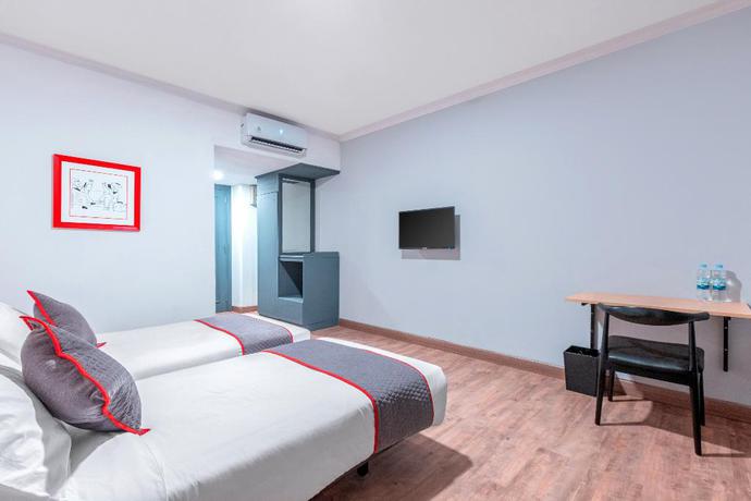 Imagen de la habitación del Hotel OYO Townhouse 2 Hotel Gunung Sahari. Foto 10