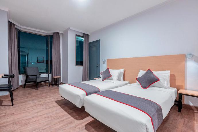 Imagen de la habitación del Hotel OYO Townhouse 2 Hotel Gunung Sahari. Foto 12