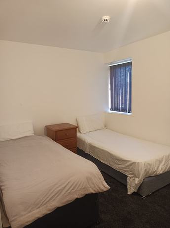 Imagen de la habitación del Hotel OYO Victoria Apartments. Foto 12