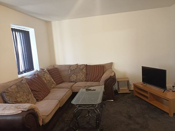 Imagen de la habitación del Hotel OYO Victoria Apartments. Foto 15