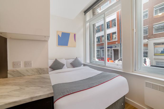Imagen de la habitación del Hotel OYO Vincent Apartments. Foto 3