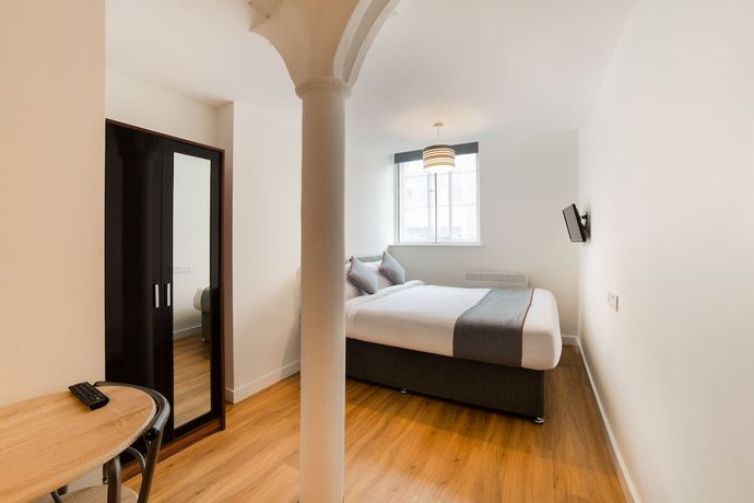 Imagen de la habitación del Hotel OYO Vincent Apartments. Foto 5
