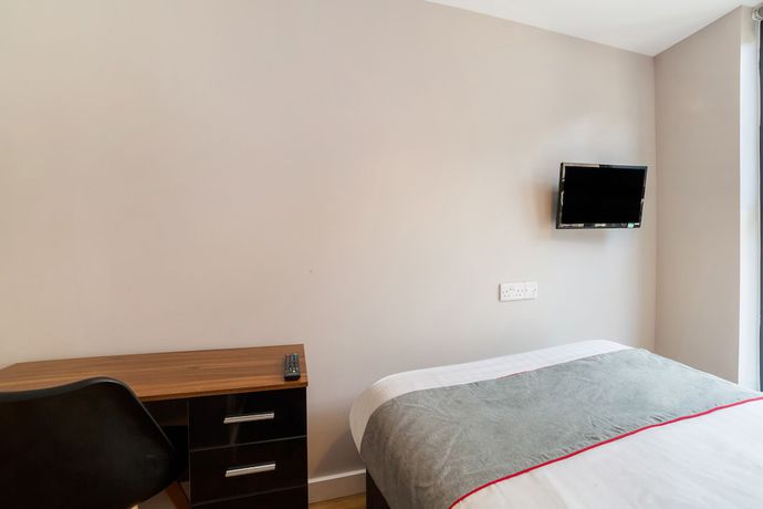Imagen de la habitación del Hotel OYO Vincent Apartments. Foto 6