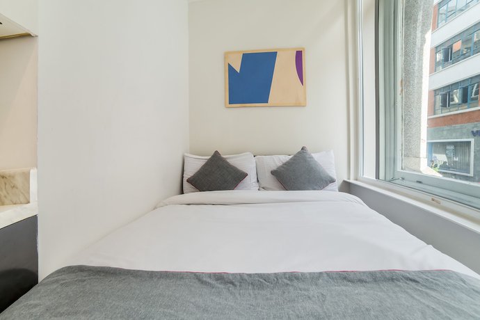 Imagen de la habitación del Hotel OYO Vincent Apartments. Foto 8