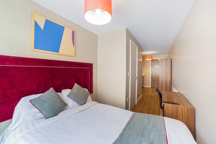 Imagen de la habitación del Hotel OYO Vincent Apartments. Foto 9
