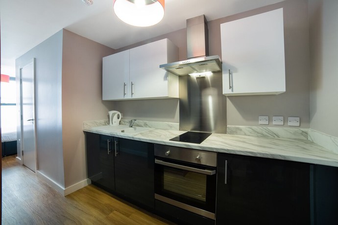 Imagen de la habitación del Hotel OYO Vincent Apartments. Foto 10