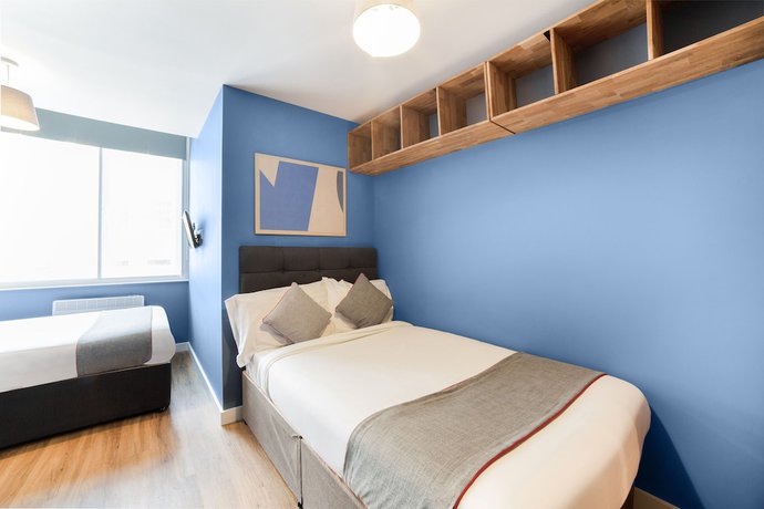 Imagen de la habitación del Hotel OYO Vincent Apartments. Foto 12