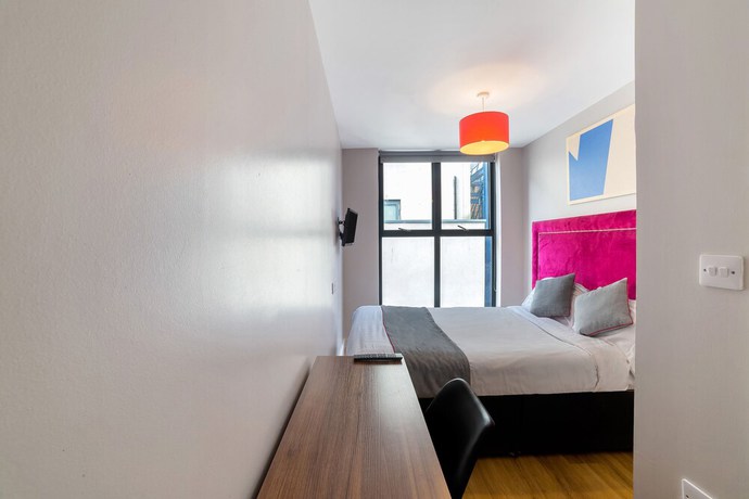 Imagen de la habitación del Hotel OYO Vincent Apartments. Foto 16
