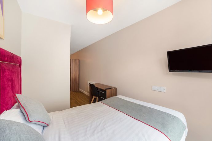 Imagen de la habitación del Hotel OYO Vincent Apartments. Foto 17