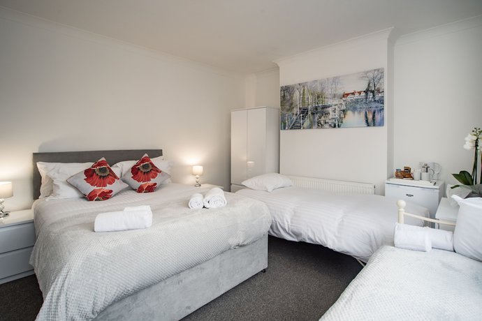 Imagen de la habitación del Hotel OYO Wilson Lodge. Foto 12