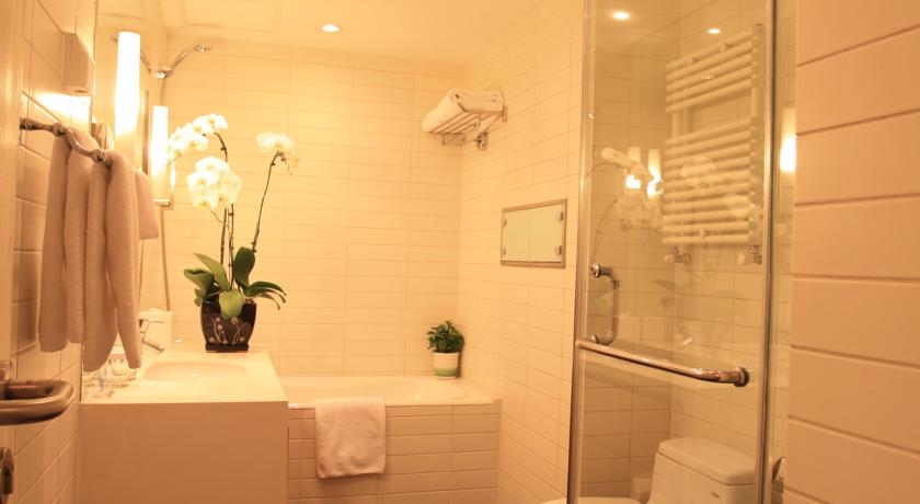 Imagen de la habitación del Hotel Oak Chateau Beijing. Foto 4