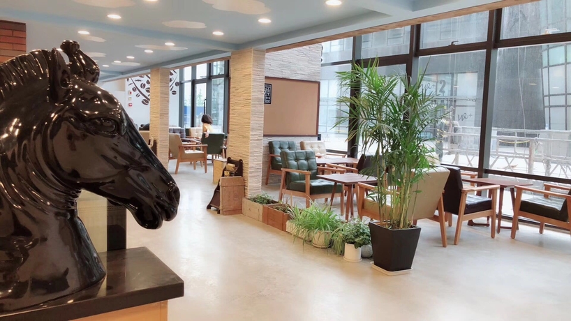 Imagen general del Hotel Oak Chateau Dalian. Foto 1