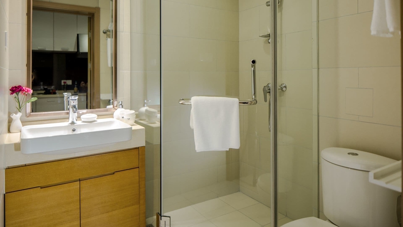 Imagen de la habitación del Hotel Oak Chateau Dalian. Foto 12