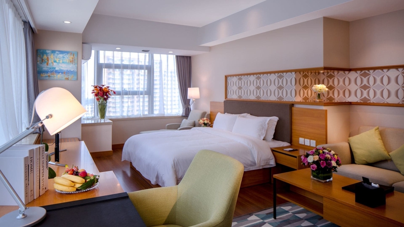 Imagen de la habitación del Hotel Oak Chateau Dalian. Foto 15