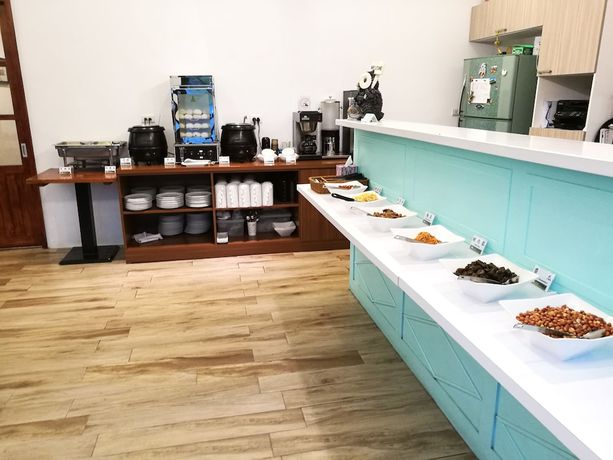 Imagen del bar/restaurante del Hotel Oak Garden. Foto 6